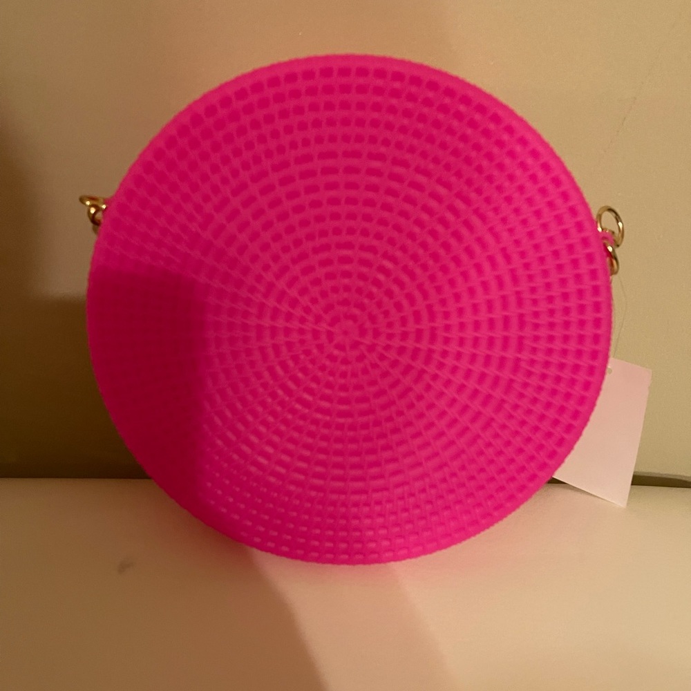 New pink round plastic purse